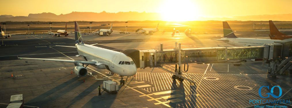 Airplane parked during sunrise