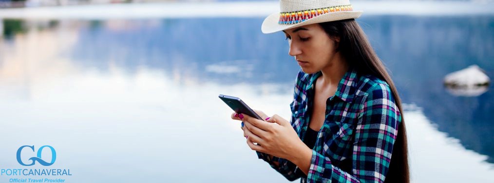 college girl gazing into her cell phone