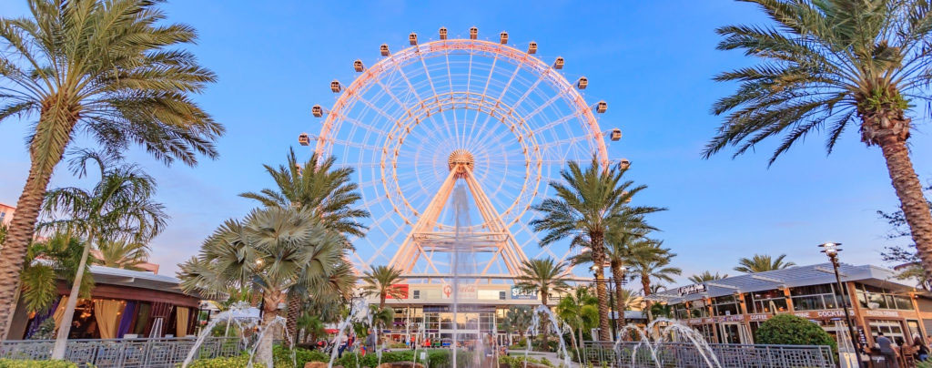 View looking up at the Orlando Eye ferris wheel at ICON park