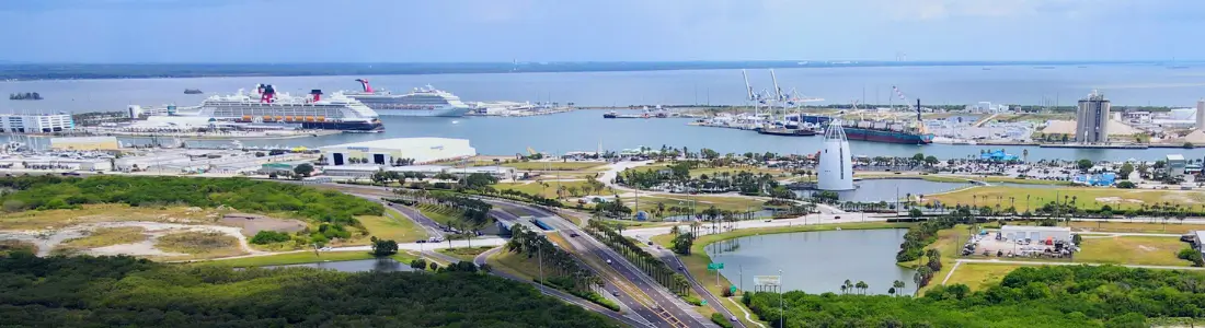 Wide view of Port Canaveral cruise terminals from a distance