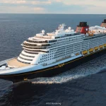 Artist rendering of the Disney Treasure cruise ship in the ocean